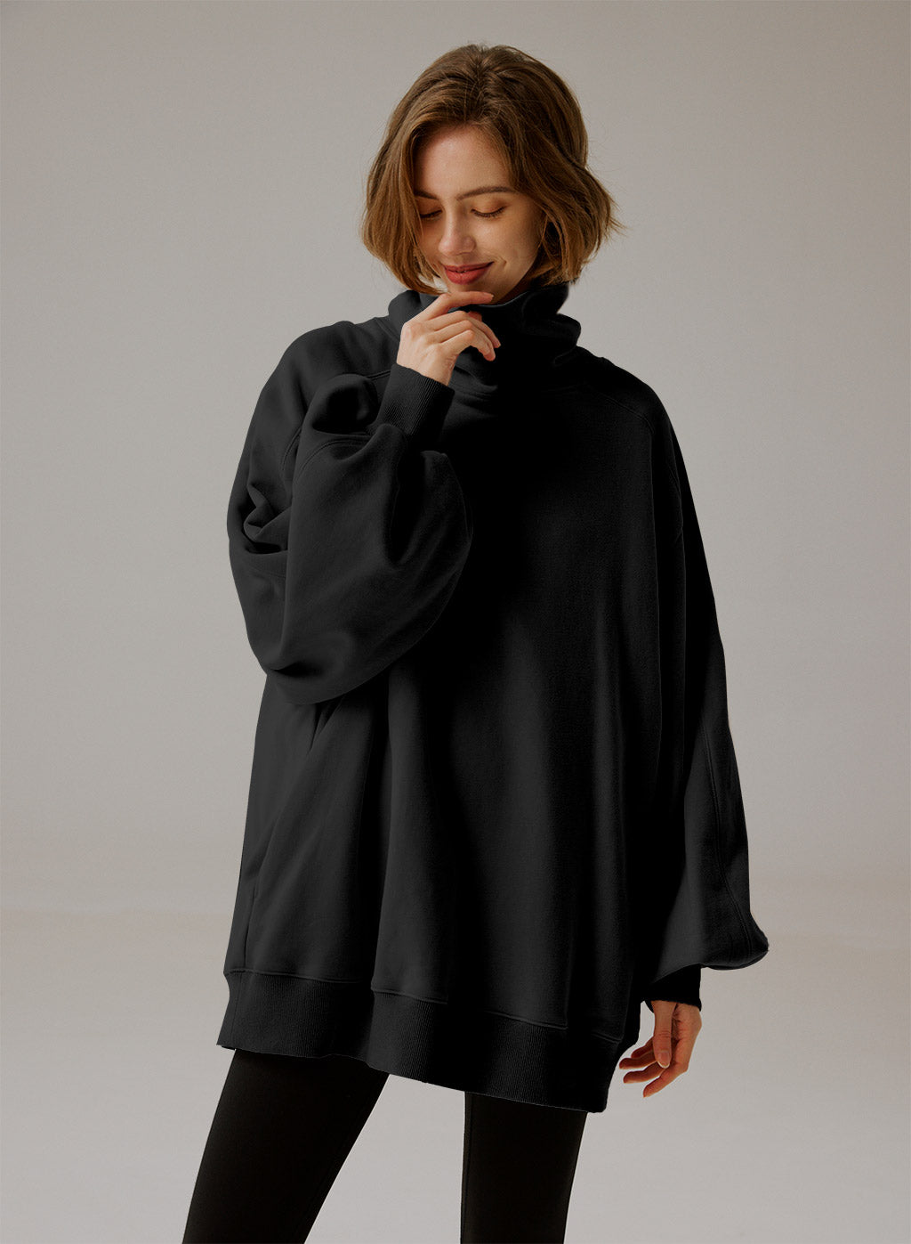 Oversize sweatshirt med rullekrave - Elegant komfort 