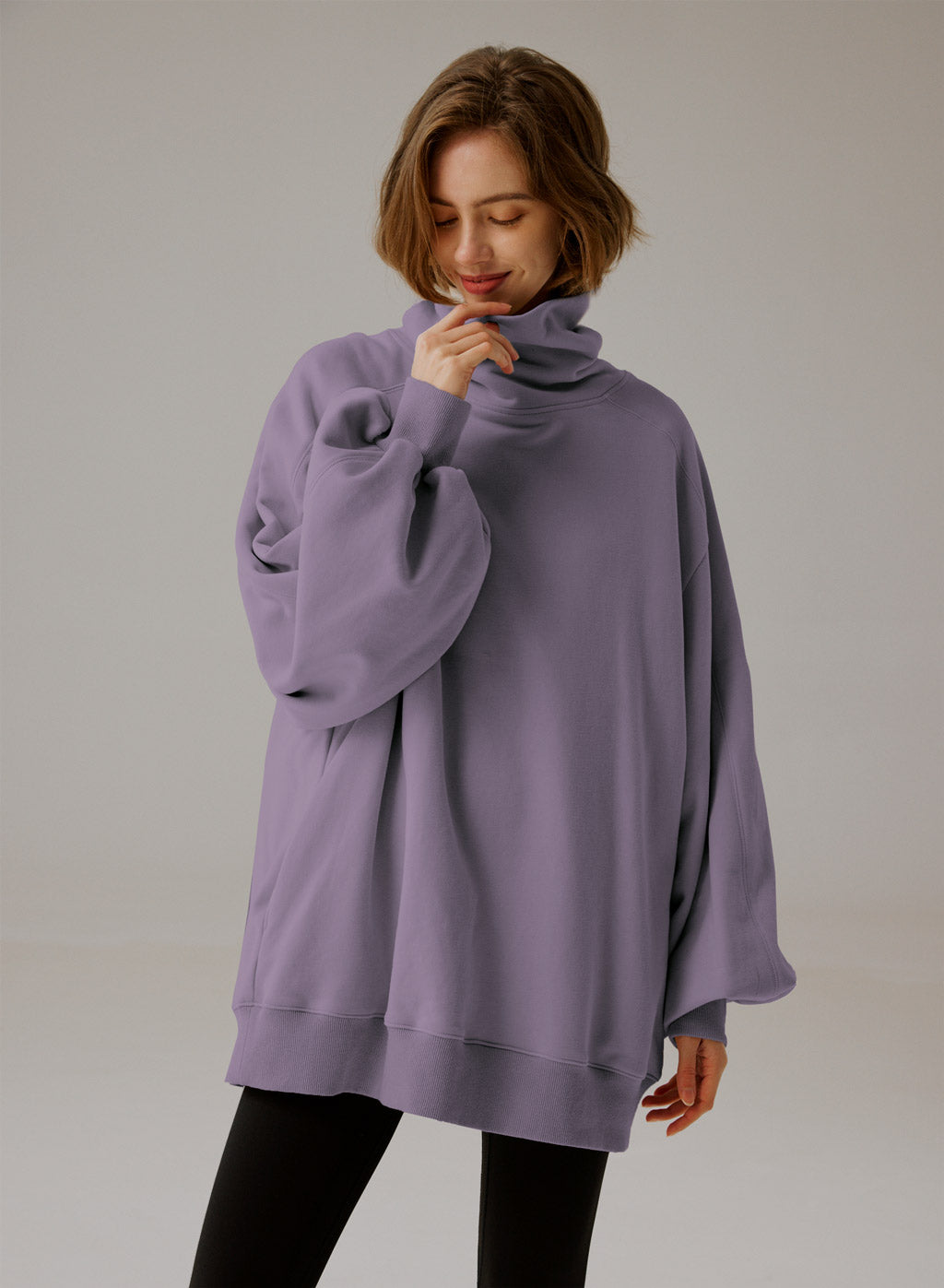 Oversize sweatshirt med rullekrave - Elegant komfort 